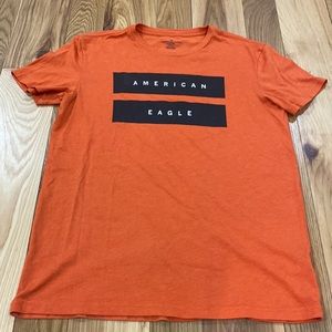 American Eagle Outfitters tee: orange with black and white